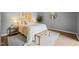 Bedroom features a comfortable bed with a white comforter, stylish decor, and soft natural light at 213 Summerwalk Cir, Chapel Hill, NC 27517