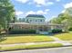Elegant home with a wraparound porch, beautiful landscaping, and well-maintained lawn at 213 Summerwalk Cir, Chapel Hill, NC 27517