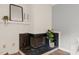 Elegant fireplace with white paneling and stylish decor, creating a cozy ambiance at 213 Summerwalk Cir, Chapel Hill, NC 27517