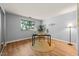 Office area has vinyl flooring, a bright window, and minimalist decor at 213 Summerwalk Cir, Chapel Hill, NC 27517