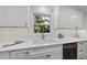 White kitchen sink and subway tile backsplash at 215 Westridge Dr, Raleigh, NC 27609