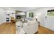 Comfortable living room with a brick fireplace and ample seating at 215 Westridge Dr, Raleigh, NC 27609