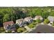 Scenic aerial view of a neighborhood with lush green trees and well-maintained homes at 221 Hammond Wood Pl, Morrisville, NC 27560