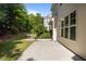 Backyard featuring concrete patio, and landscaping at 221 Hammond Wood Pl, Morrisville, NC 27560