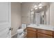 Bathroom featuring a vanity with a sink, a toilet, and a mirror at 221 Hammond Wood Pl, Morrisville, NC 27560