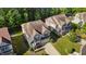 Charming two-story home with manicured landscaping and an attached two-car garage at 221 Hammond Wood Pl, Morrisville, NC 27560