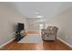 View of the living room showing hardwood floors and ample space at 221 Hammond Wood Pl, Morrisville, NC 27560