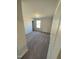 This bedroom showcases neutral carpet and a window, creating a relaxing and comfortable space at 222 Oak Branch Trl, Garner, NC 27529