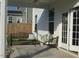 Covered patio with comfortable bench seating, a ceiling fan, and view of the yard at 222 Oak Branch Trl, Garner, NC 27529
