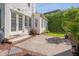 Well-maintained backyard featuring a patio and manicured landscaping, perfect for entertaining at 2306 Byrd St, Raleigh, NC 27608