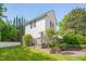 Charming two-story home with well-maintained lawn and mature landscaping offering great curb appeal at 2306 Byrd St, Raleigh, NC 27608