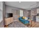 Relaxing living room with comfortable seating, natural light, and stylish decor, perfect for unwinding at 2306 Byrd St, Raleigh, NC 27608