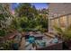Inviting outdoor patio with stylish seating, string lights, and lush greenery for relaxing and entertaining at 2306 Byrd St, Raleigh, NC 27608