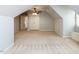 Large bonus room features neutral carpet, dormer windows with built-in seat, and a ceiling fan at 2405 Flints Pond Cir, Apex, NC 27523