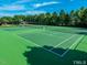 Well maintained community tennis courts at 2405 Flints Pond Cir, Apex, NC 27523