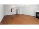 Spacious living room boasts hardwood floors, fireplace, and seamless flow to the kitchen at 2609 Asher View Ct, Raleigh, NC 27606