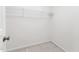 Walk-in closet features an open storage system and carpeted floor at 2609 Asher View Ct, Raleigh, NC 27606