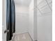 Walk-in closet with carpeted floors, wire shelving, and hanging storage at 2609 Asher View Ct, Raleigh, NC 27606