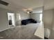 Large bonus room/den with a sofa and carpet, and open access to other rooms at 267 Darecrest Ln, Wendell, NC 27591