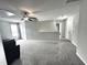Large bonus room/den with carpet and neutral walls at 267 Darecrest Ln, Wendell, NC 27591