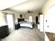 Spacious main bedroom featuring neutral walls, ceiling fan, and bedroom furnishings at 267 Darecrest Ln, Wendell, NC 27591