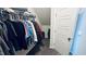 Bright walk-in closet featuring upper-level storage and rods for hanging garments at 267 Darecrest Ln, Wendell, NC 27591