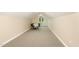 Spacious bonus room features neutral walls and carpet with a small dining table and window at 2913 Escondido Farm Rd, Garner, NC 27529