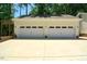 Spacious two-car garage featuring stylish doors and ample parking space, enhancing curb appeal at 2913 Escondido Farm Rd, Garner, NC 27529