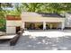 Large garage with parking, lawn equipment, and a loft at 2913 Escondido Farm Rd, Garner, NC 27529