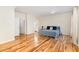Large main bedroom features hardwood floors, white walls, and an ensuite bathroom at 2913 Escondido Farm Rd, Garner, NC 27529