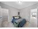 Bedroom features neutral walls, carpet flooring, and a queen-size bed at 300 Scotland Dr, Youngsville, NC 27596