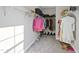 Bright walk-in closet with wire shelving and carpet flooring at 300 Scotland Dr, Youngsville, NC 27596