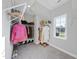 Bright walk-in closet with wire shelving and carpet flooring at 300 Scotland Dr, Youngsville, NC 27596