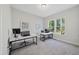 Bright home office with two workstations and large windows for natural light at 300 Scotland Dr, Youngsville, NC 27596