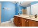 Bright bathroom with double vanity, framed mirror, tile flooring, and a shower-tub combination at 30150 Walser, Chapel Hill, NC 27517