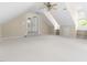 Spacious bonus room featuring neutral carpeting, recessed lighting, and ample natural light at 30150 Walser, Chapel Hill, NC 27517