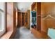 Spacious walk-in closet with custom wood shelving, plenty of hanging space, and natural light at 30150 Walser, Chapel Hill, NC 27517