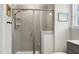Modern bathroom with glass-enclosed shower, sleek vanity, and contemporary fixtures at 3017 Ginger Hill Ln, Durham, NC 27703