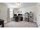 Bright home office with large window and dual monitor setup, perfect for remote work at 3017 Ginger Hill Ln, Durham, NC 27703