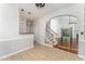 Inviting entryway with tile flooring and an arched doorway leading into the spacious living room at 302 Red Elm Dr, Durham, NC 27713