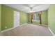 Comfortable bedroom features carpeted floors, ceiling fan and a window for natural light at 3035 Tavistock Dr, Durham, NC 27712