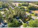 A high aerial view of the home's surroundings showcasing mature trees, and neighborhood at 3204 Terrel Mill Rd, Raleigh, NC 27616