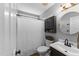 Bathroom featuring grey walls, a white shower curtain, vanity, and dark colored cabinets at 3204 Terrel Mill Rd, Raleigh, NC 27616