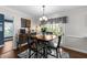 Dining area with natural light, a table with seating for four, and access to an outdoor deck at 3204 Terrel Mill Rd, Raleigh, NC 27616