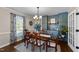 Dining room with hardwood floors, built-in cabinetry and a view of the backyard at 3204 Terrel Mill Rd, Raleigh, NC 27616