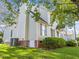 Exterior featuring lush greenery, a well-maintained lawn, and a charming home at 3204 Terrel Mill Rd, Raleigh, NC 27616