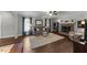 Cozy living room with a brick fireplace, plush rug, and comfortable seating at 3204 Terrel Mill Rd, Raleigh, NC 27616
