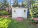 Well-maintained storage shed in a serene backyard setting, providing ample outdoor storage space at 3204 Terrel Mill Rd, Raleigh, NC 27616