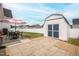 Well-maintained backyard features a patio set, shed, and plenty of open green space at 321 Everly Mist Way, Wake Forest, NC 27587