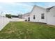 Expansive backyard featuring well-kept grass, a privacy fence, and an inviting outdoor space at 321 Everly Mist Way, Wake Forest, NC 27587